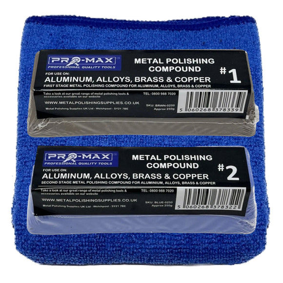 Two packs of Pro-Max metal polishing compound on a blue towel with labels.