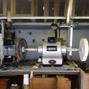 Draper 6" 370W Bench Grinder with a silver metal body, red switch and polishing wheels mounted on both spindles