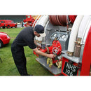 Peek Metal Polish tube shown being used to clean brass fittings on a red fire engine