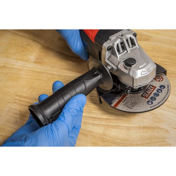 Sealey 115mm angle grinder with silver metal gear head, black side handle and abrasive cutting disc